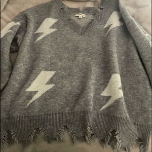 Lightning bolt gray and white sweater from a boutique